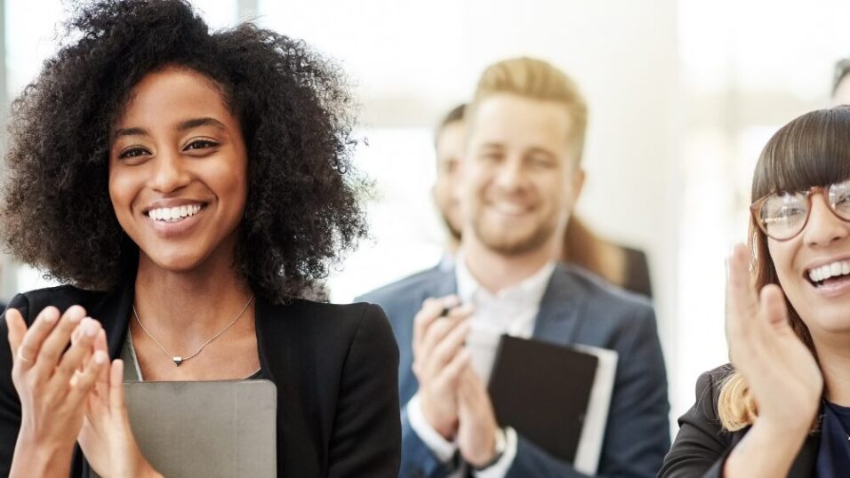 Group of people clapping